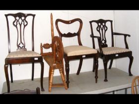 Three antique chairs together with a spinning whee