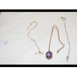 An oval amethyst? pendant and chain together with