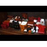 A stock of dolls house accessories including minia
