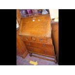 An oak bureau - width 73cms