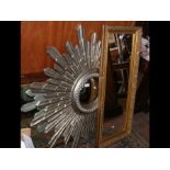 A sunburst wall mirror, together with one other mi