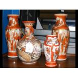 A pair of satsuma vases and one other