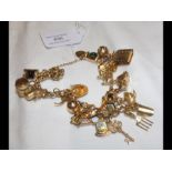 A 9ct gold charm bracelet