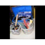 A blue tool box full of useful tools, including el