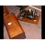 An old Vickers sewing machine in carrying case