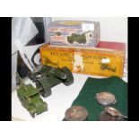 A Britains Howitzer - boxed, together with a Dinky