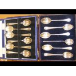 A cased set of six silver teaspoons, together with