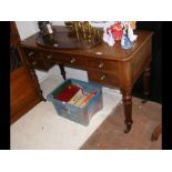 A Victorian mahogany desk with fluted legs