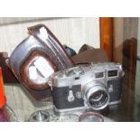 A vintage Leica M3 839027 35mm rangefinder camera in case