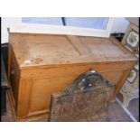 An antique pine panelled chest - 125cms wide