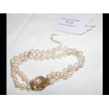 An Isle of Wight pearl double stranded bracelet wi