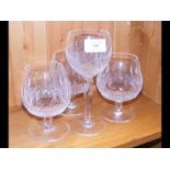 Three Waterford brandy glasses and a Waterford whi