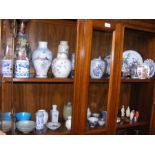 Two shelves of collectable Oriental china and snuf