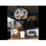 A French style table lamp and mantel clock togethe