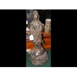 A 50cm high bronze figure of Goddess riding mythic