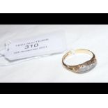 A diamond ring in 18ct gold setting