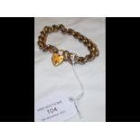 A 9ct bracelet with heart clasp