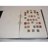 An album containing collectable stamps, China and