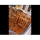 A set of eight antique slat back chairs - each stamped
