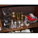 An assortment of metal ware including brass shell