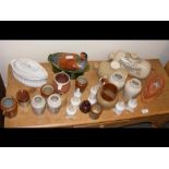 Various old stoneware bottles, game pie dishes