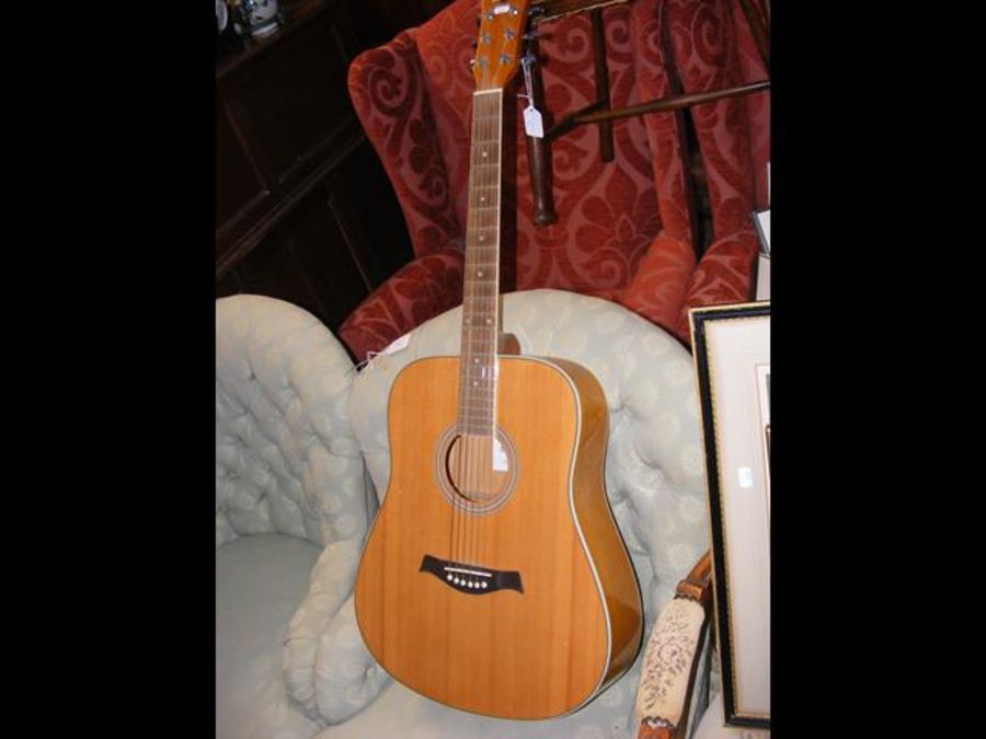A Gear4music six string acoustic guitar