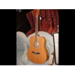 A Gear4music six string acoustic guitar