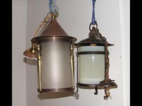 A decorative porch light and one other