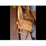 Six pine wheelback and spindle dining chairs (2 ca