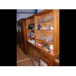 A double length pine dresser with four drawers and