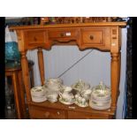 A pine knee hole dressing table with three small d