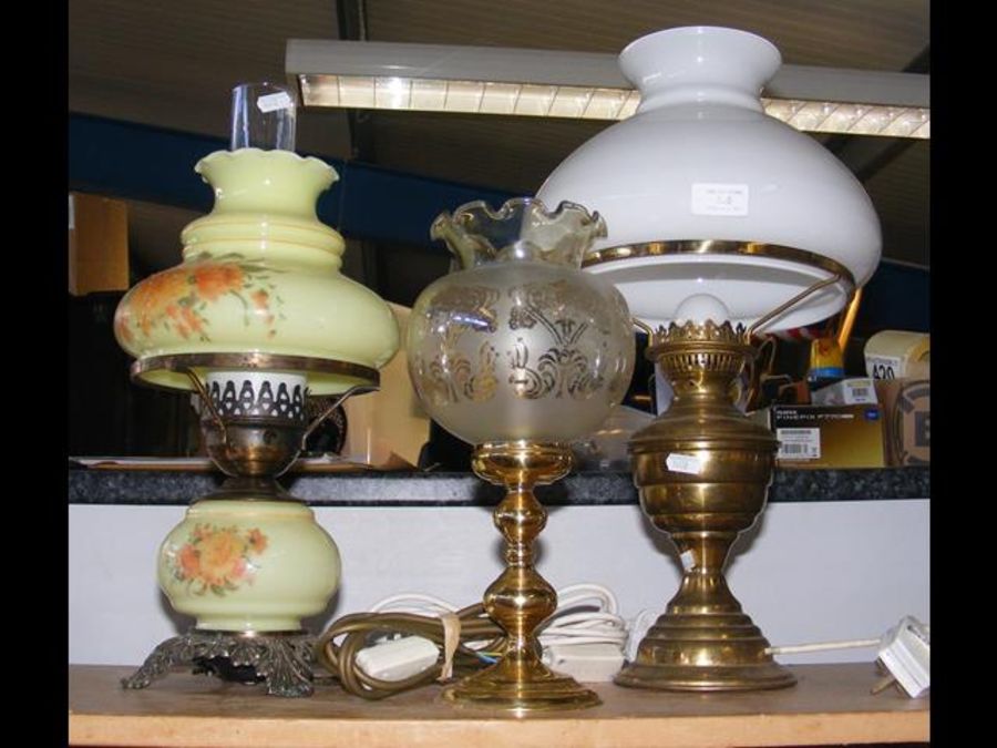 Three converted oil lamps