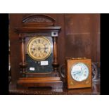 An antique mantel clock, together with one other
