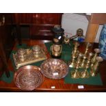 A number of metal objects including candlesticks a