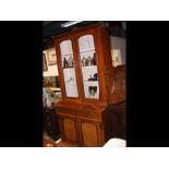 A Victorian mahogany bookcase with glazed upper se