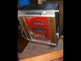 A vintage arcade 'Big Strike' bowling game
