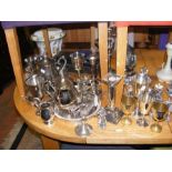 A medley of silver plated items