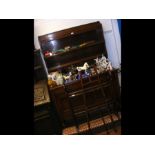 A 1930's oak dresser with shelves to back - width