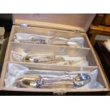 A six place setting of silver plated cutlery