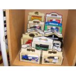 A collection of boxed die cast vehicles, including