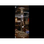 A 58cm high solid glass lamp