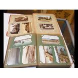 A postcard album with scenes from around The Isle