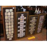 Three framed displays of collector's cards