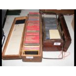 A wooden box of magic lantern slides - various sub