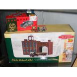 A boxed Trackside two piece tin plate depot and pl