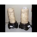 A pair of antique carved ivory columns