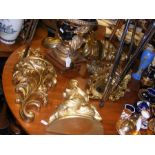 An assortment of gilt wall brackets and garnitures