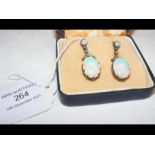 A pair of attractive vintage opal and diamond drop
