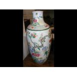 A 44cm high Oriental vase with bird and tree decor