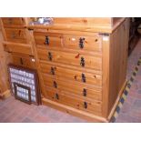 The matching pine chest of two short and four long